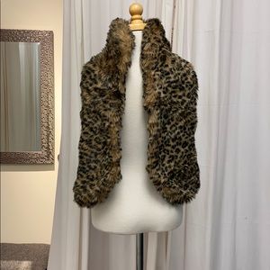 Faux fur leopard vest. Never worn. Girl's 6/7